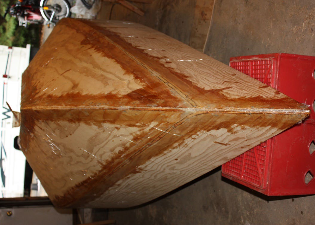 Fiberglassing the seams with West System epoxy
